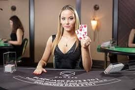 spinplus live casino tables showing baccarat and blackjack for Philippine players